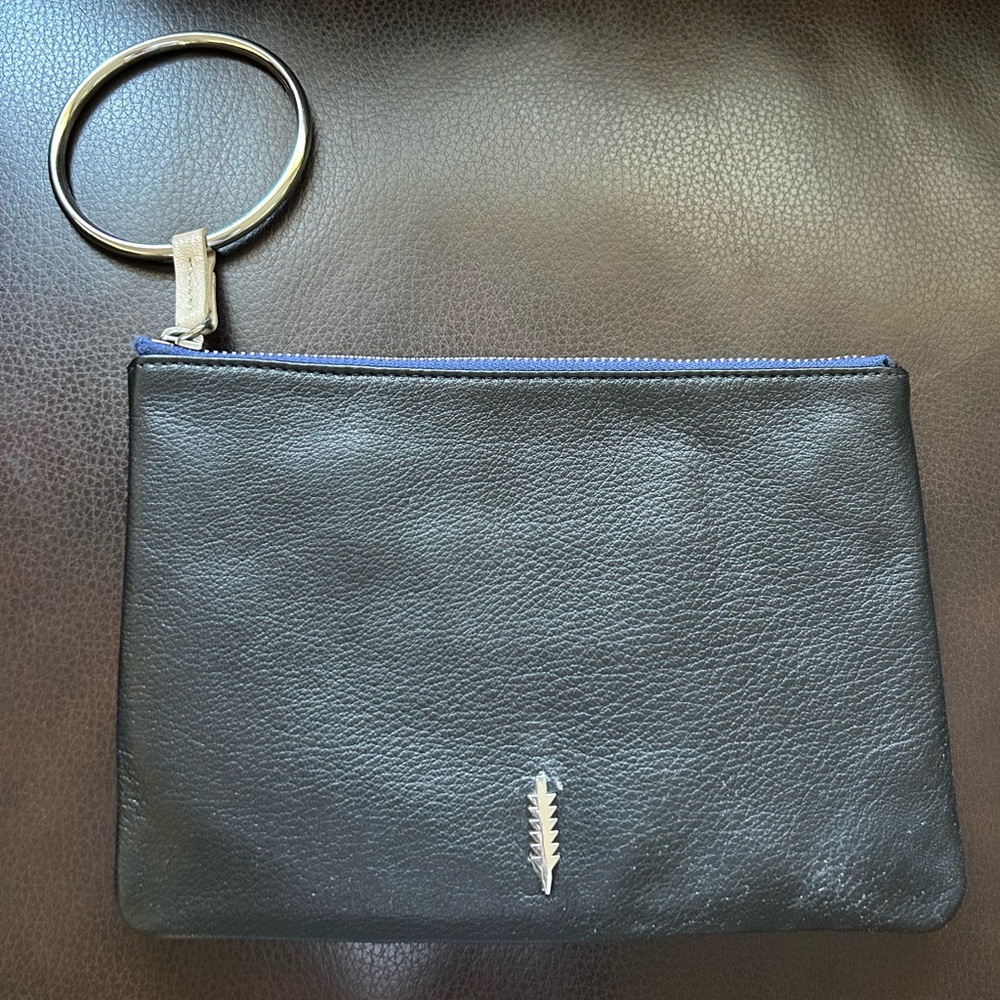 Thacker New York Sleek Black Leather Wristlet with Modern Design